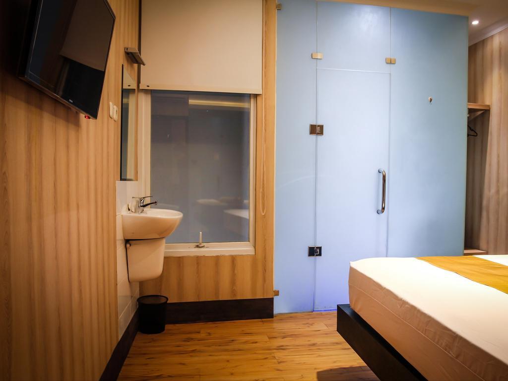 Madu Inn Джакарта Номер фото