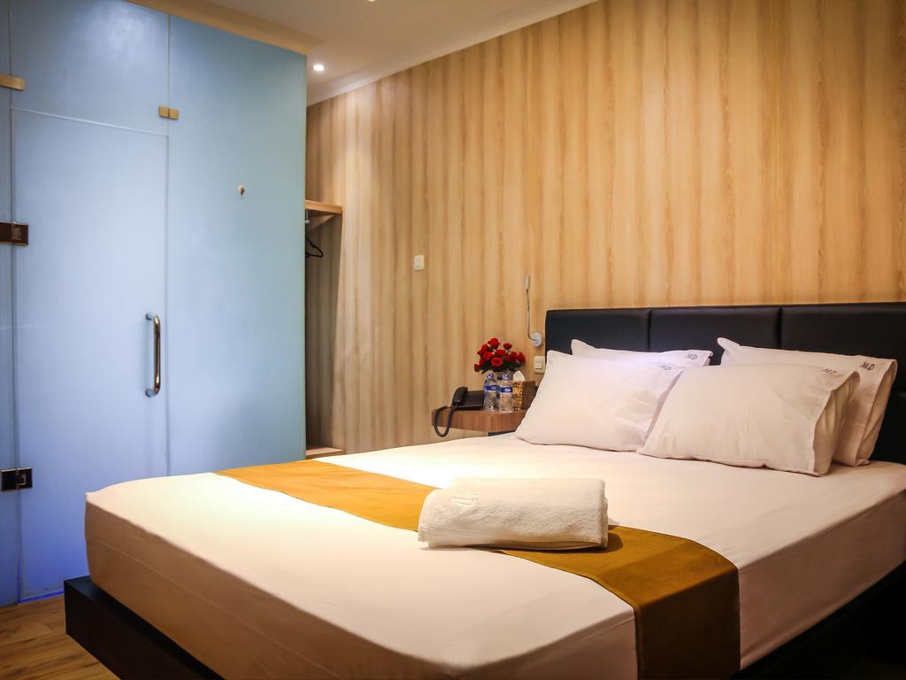 Madu Inn Джакарта Номер фото