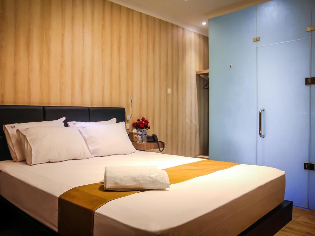 Madu Inn Джакарта Номер фото